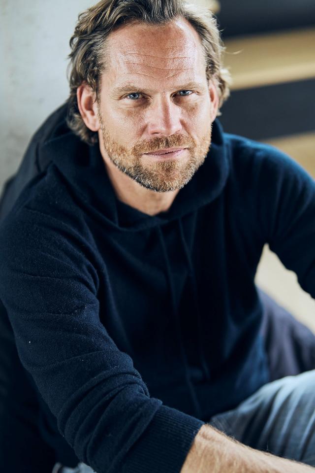 Andreas H. ist ein männliches Moderation Model mit blauen Augen und dunkelblonden Haaren aus München