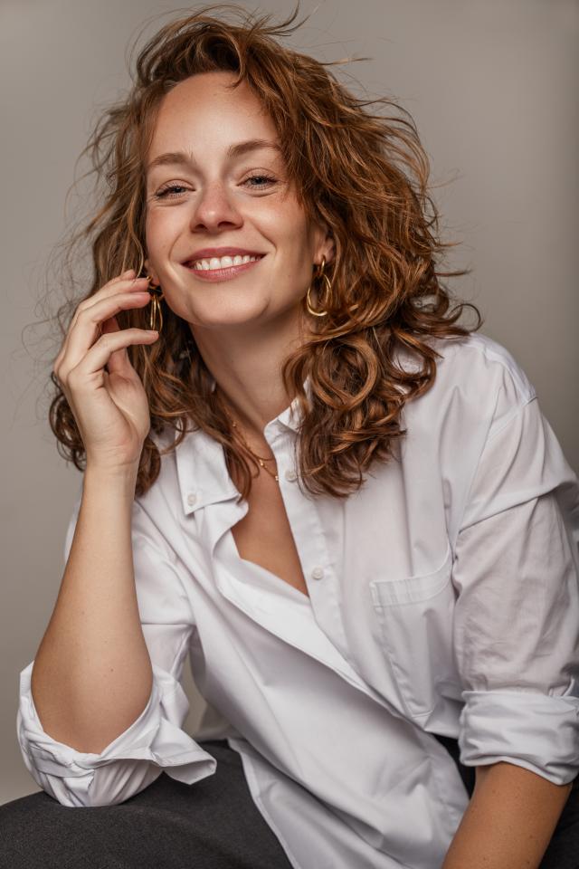 Lisa D. ist ein weibliches Sport Model mit blau-grünen Augen und rot-blonden Haaren aus München